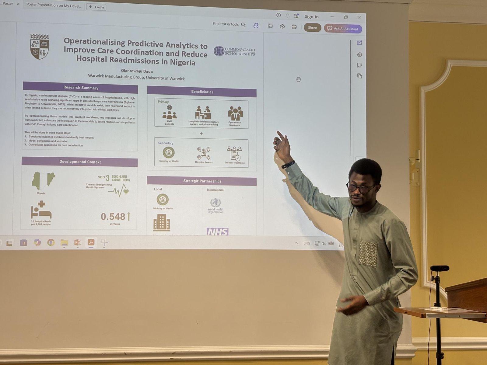 Olanrewaju presenting a research poster on predictive analytics and hospital readmissions in Nigeria